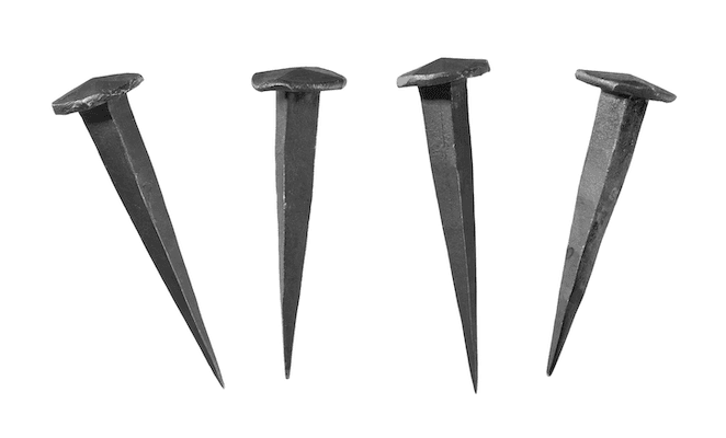 Four ancient-type nails in a line image | Featured image for the HSEQ Management System page for CertCrowd